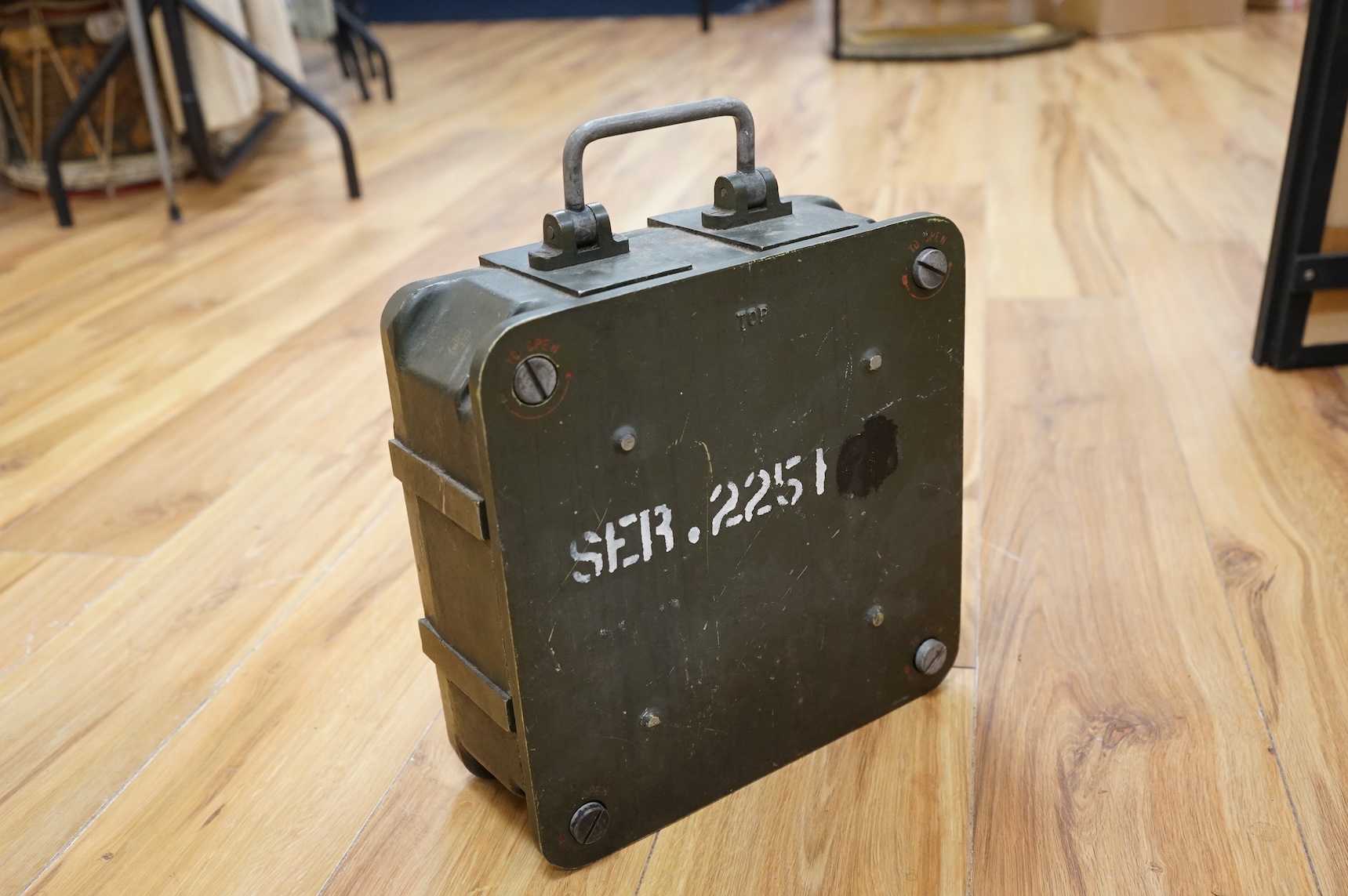A British military Astral Smiths eight day signal clock, housed in a metal alloy case with detachable cover, 29 x 29 x 12cm